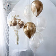 Colorful balloons floating in the air, adding joy and festivity to a wedding celebration.