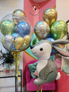 A cute bunny balloon surrounded by colorful balloons and another bunny. Pure balloon fun!