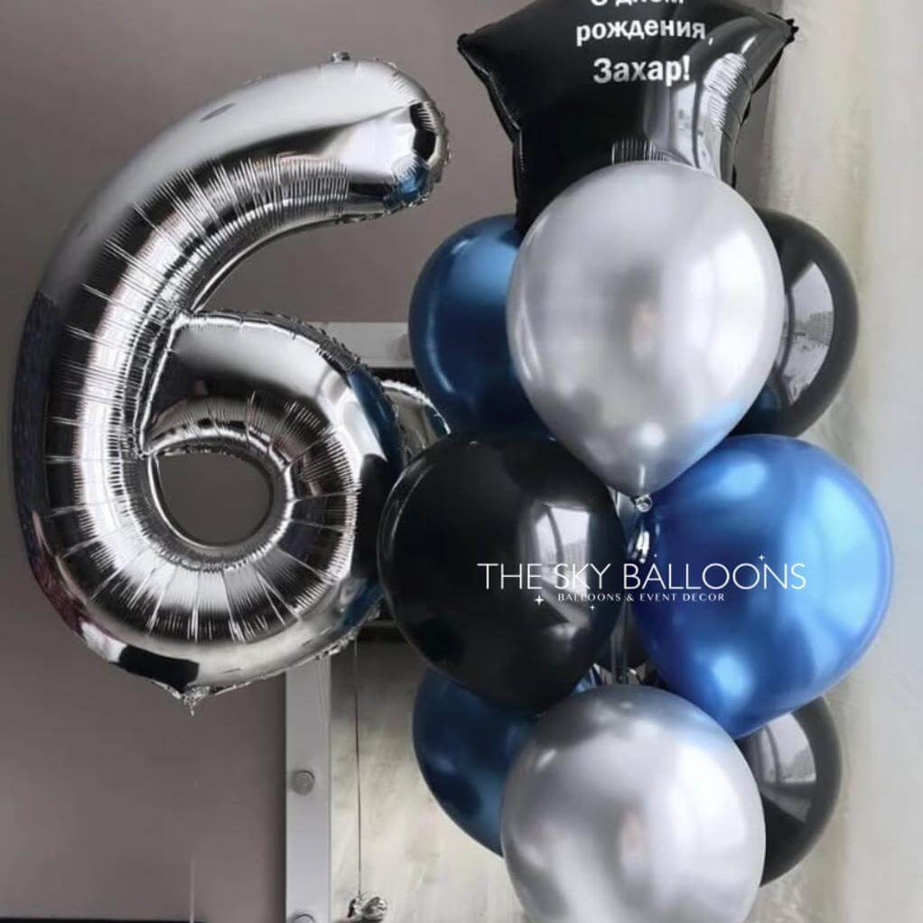 Bouquet of balloons including a large silver number '6' and various colored balloons with a visible brand name.