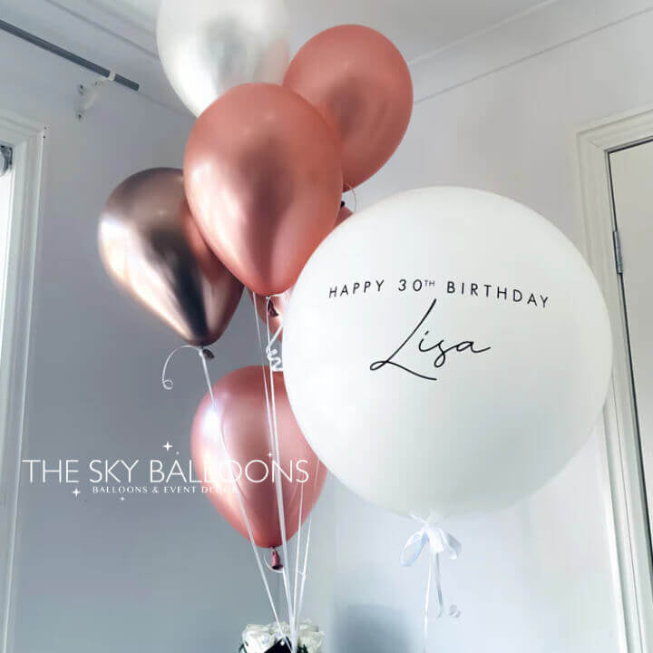 Elegant Rose Gold Balloons Bouquet featuring metallic finish balloons in various sizes, perfect for luxury celebrations and special occasions