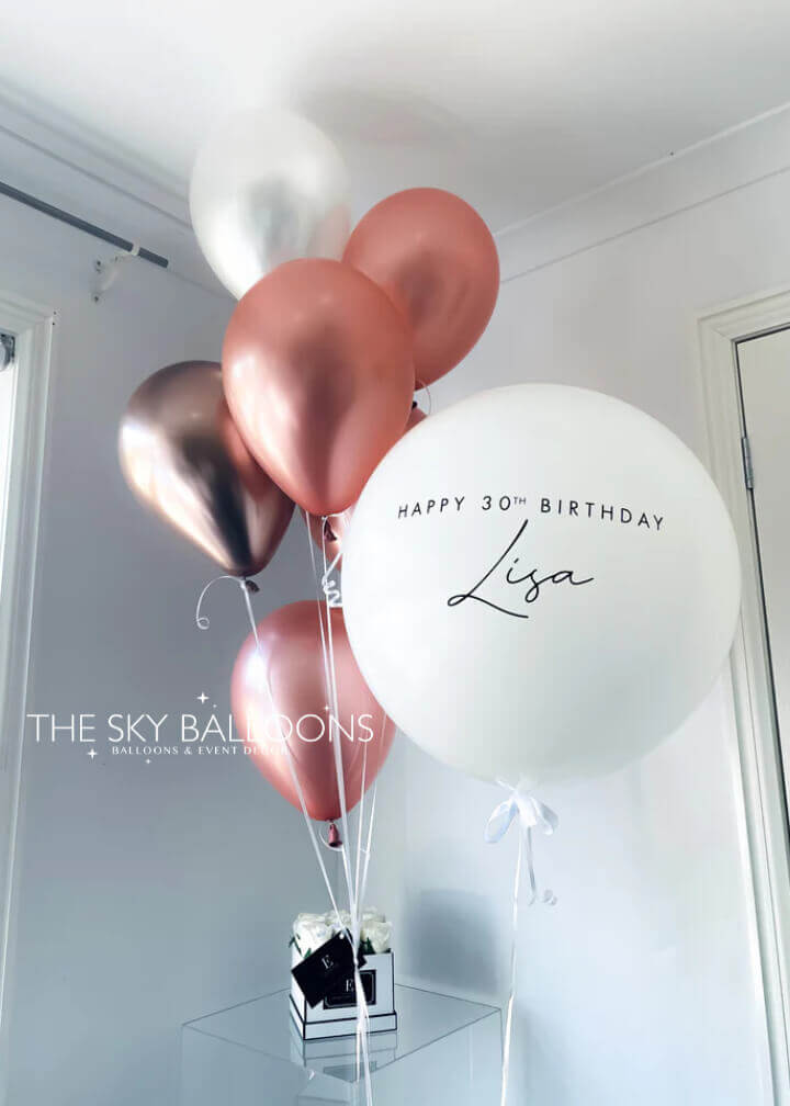 Elegant Rose Gold Balloons Bouquet featuring metallic finish balloons in various sizes, perfect for luxury celebrations and special occasions