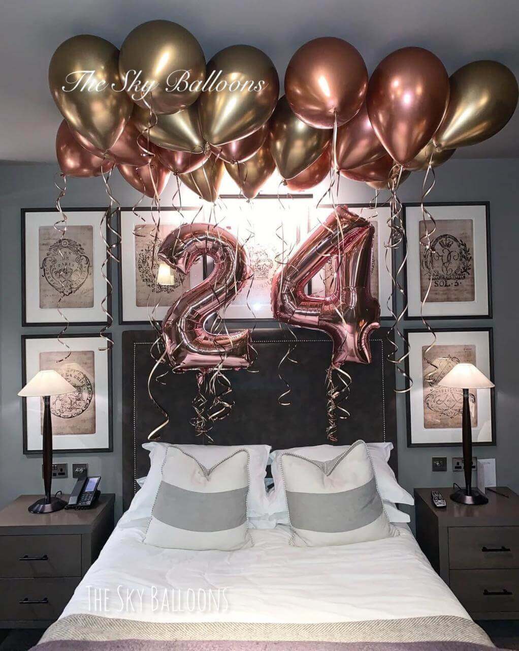 Happy 24th birthday balloon arrangement in colorful party setup