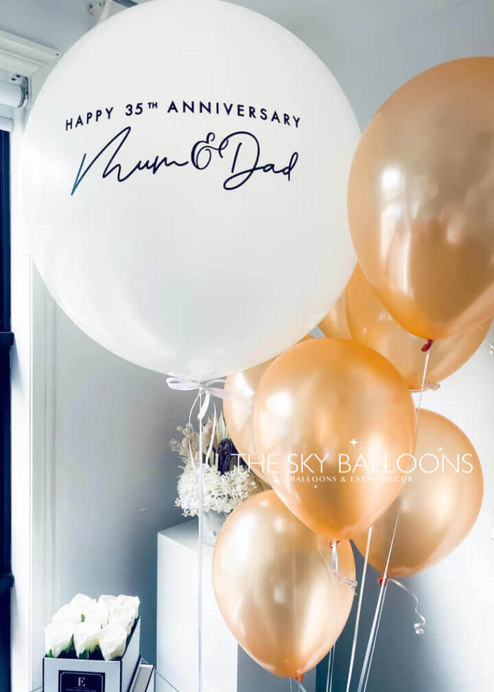 Colorful Happy Birthday Balloons Set featuring helium-filled latex balloons and personalized birthday balloon with festive decorations