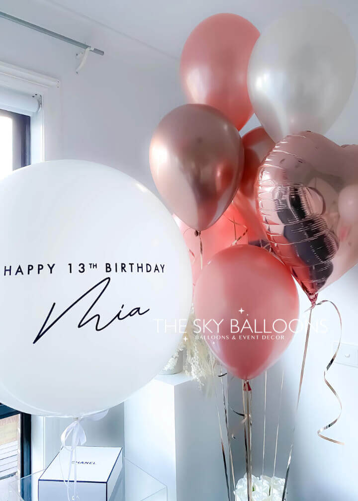 Elegant Rose Gold Personalized Bubble Balloon with customizable text, featuring transparent outer layer and metallic rose gold confetti