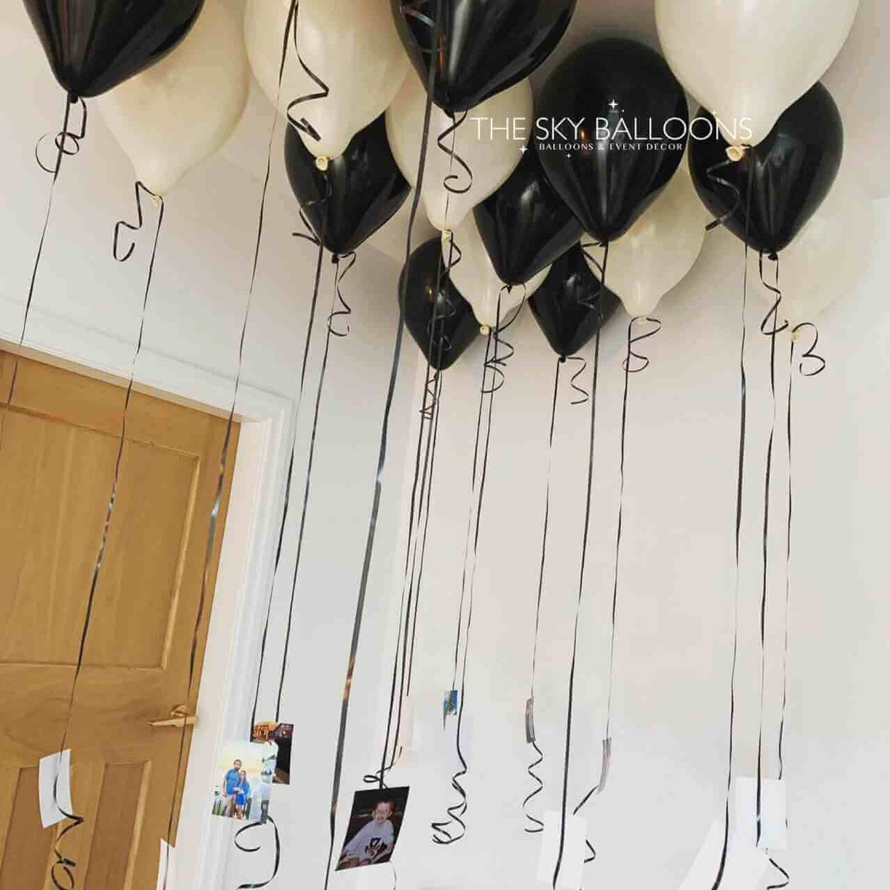 Cream and Black balloons with photograph