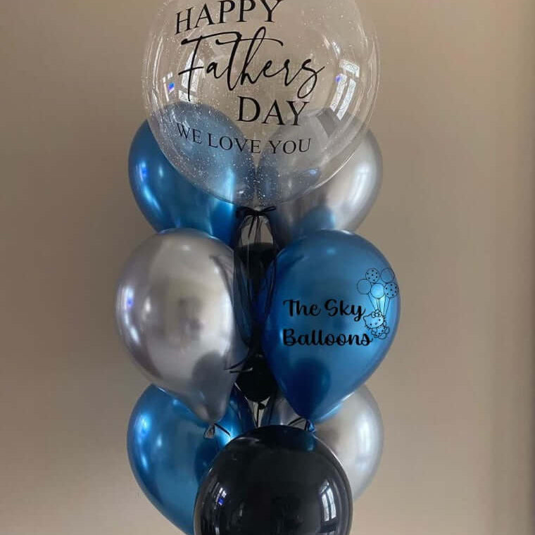 Colorful balloon bouquet with "Happy Father's Day" message, perfect gift to celebrate dad's special day.