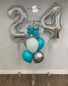 A numerical balloon bouquet with the numbers '24' in silver, surrounded by blue and silver balloons, with helium gas, including customized text 'Happy Birthday' and a name 'Sayed'.