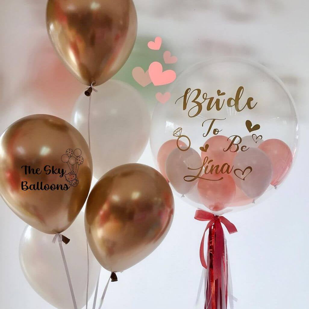 A beautiful bouquet of golden bride balloons, perfect for a wedding celebration.