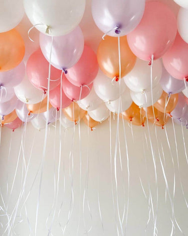 White ceilling balloons with Gold Number 33