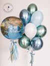 A blue and silver balloon with a globe design, symbolizing the world.