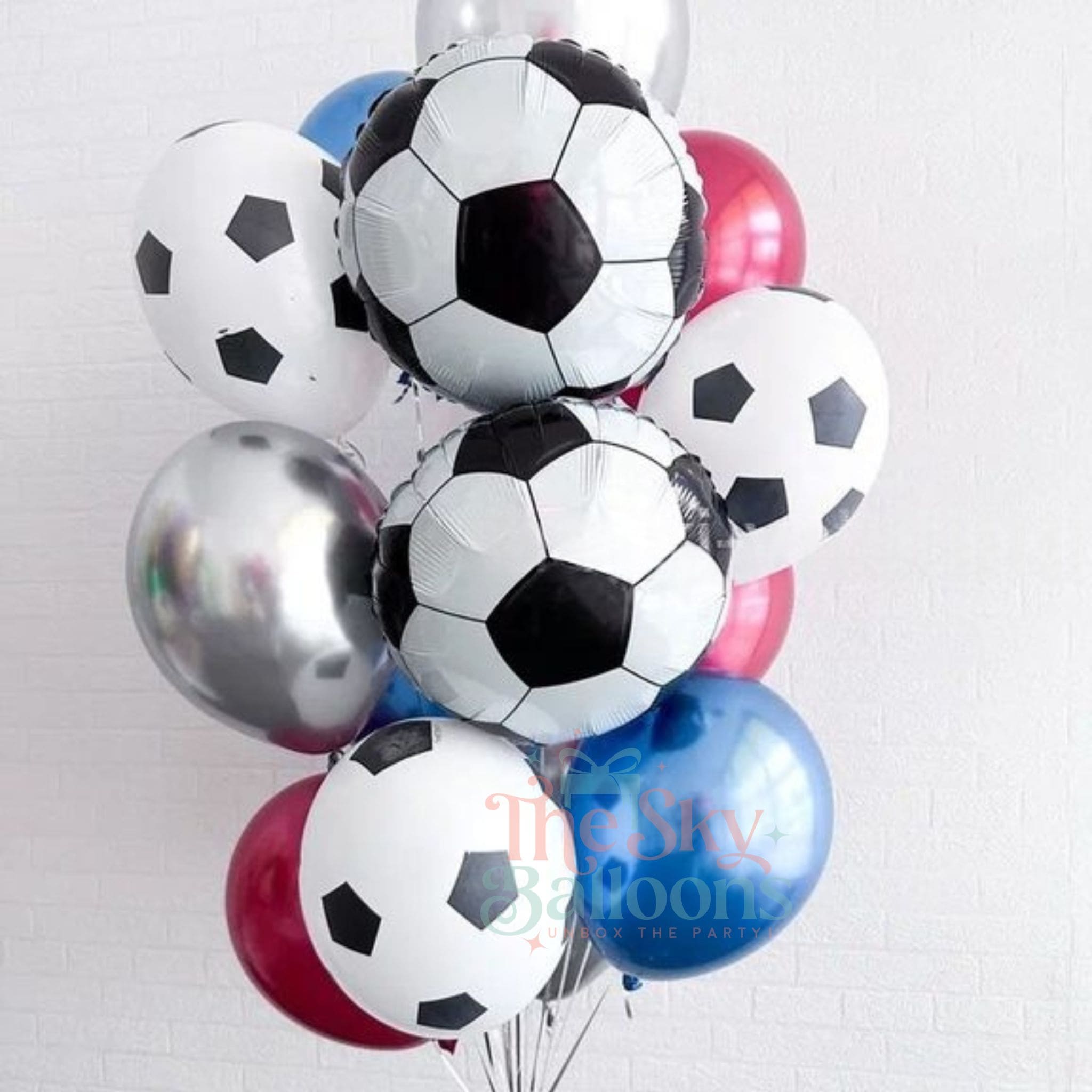 Bouquet of soccer ball-themed balloons with a white background