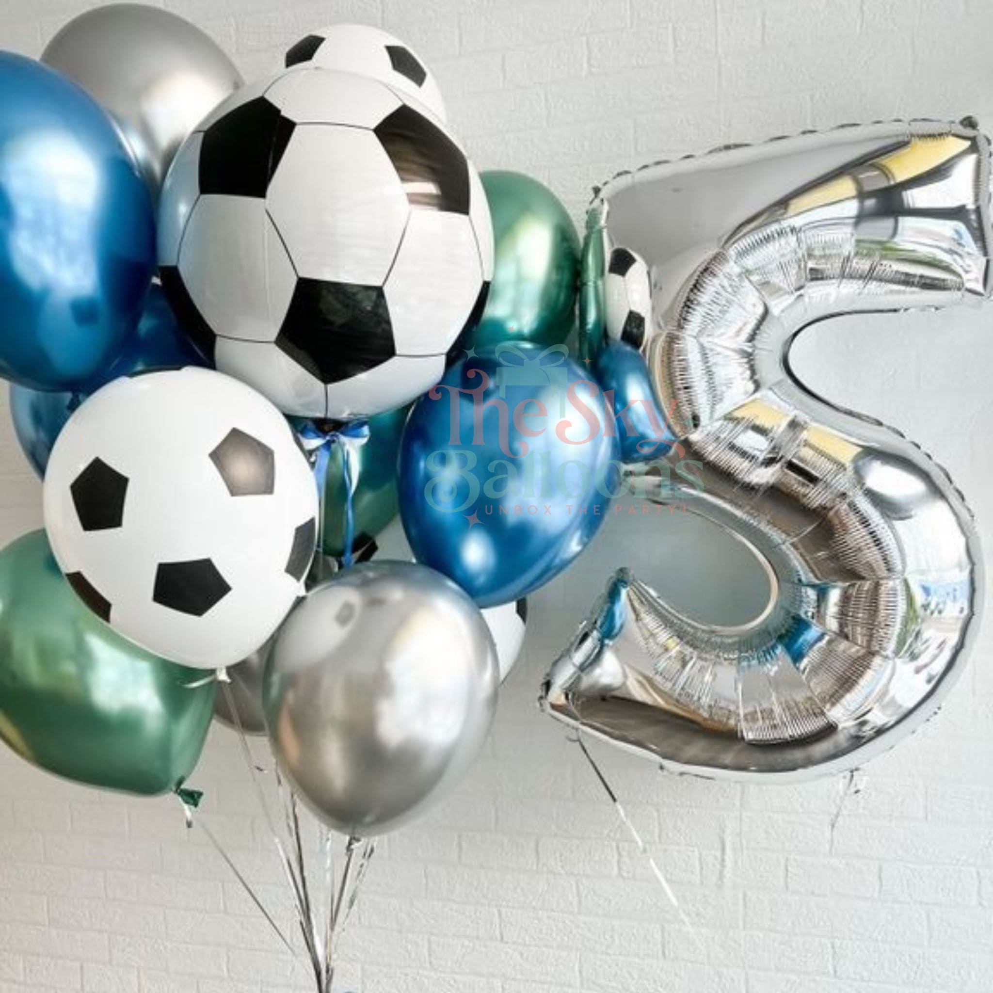 Balloon bouquet with soccer ball and number 5 design on a light gray background