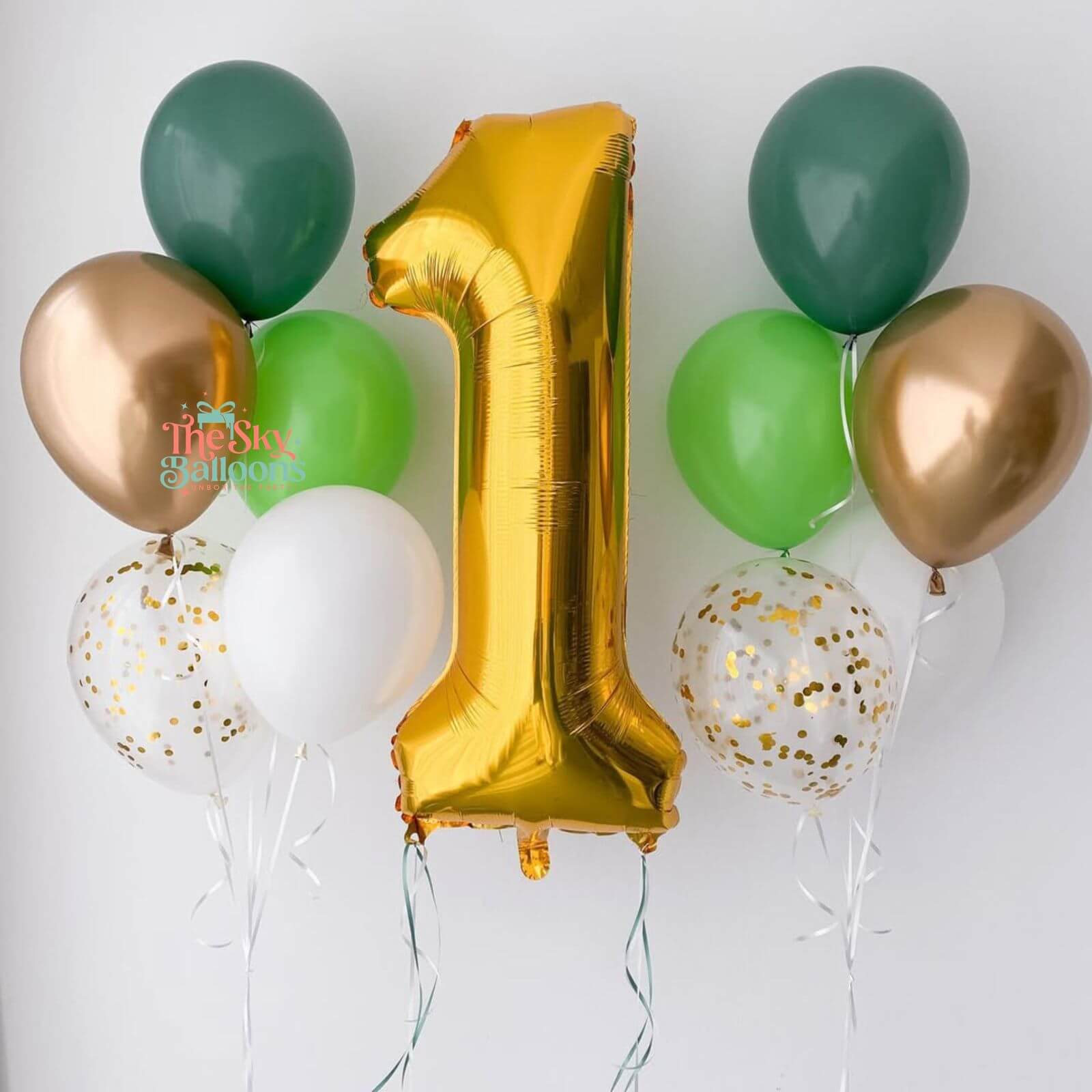Gold number 1 balloon with green, gold, and white balloons on a white background