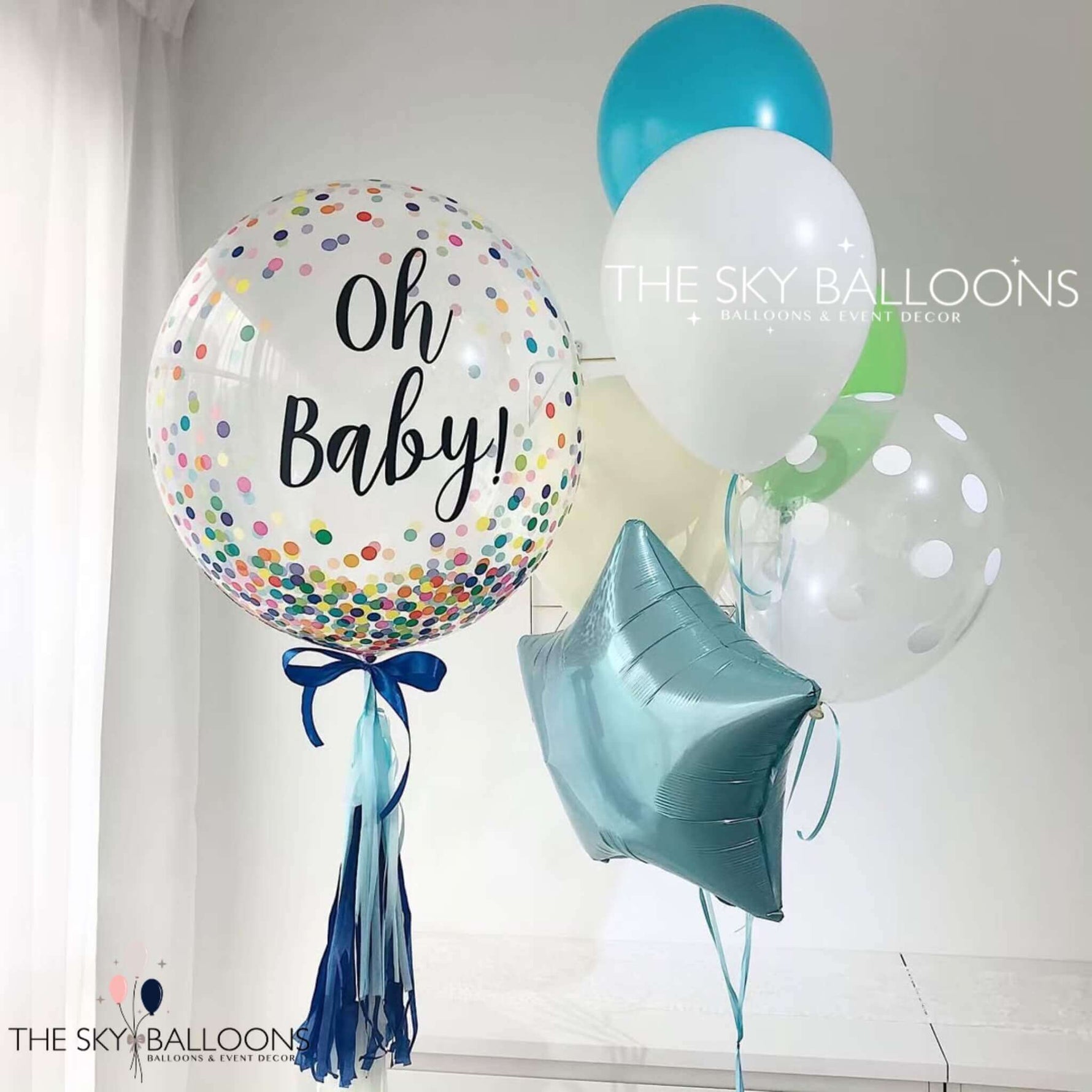 A vibrant assortment of balloons with "Oh Baby" written on them, ideal for welcoming a new arrival.
