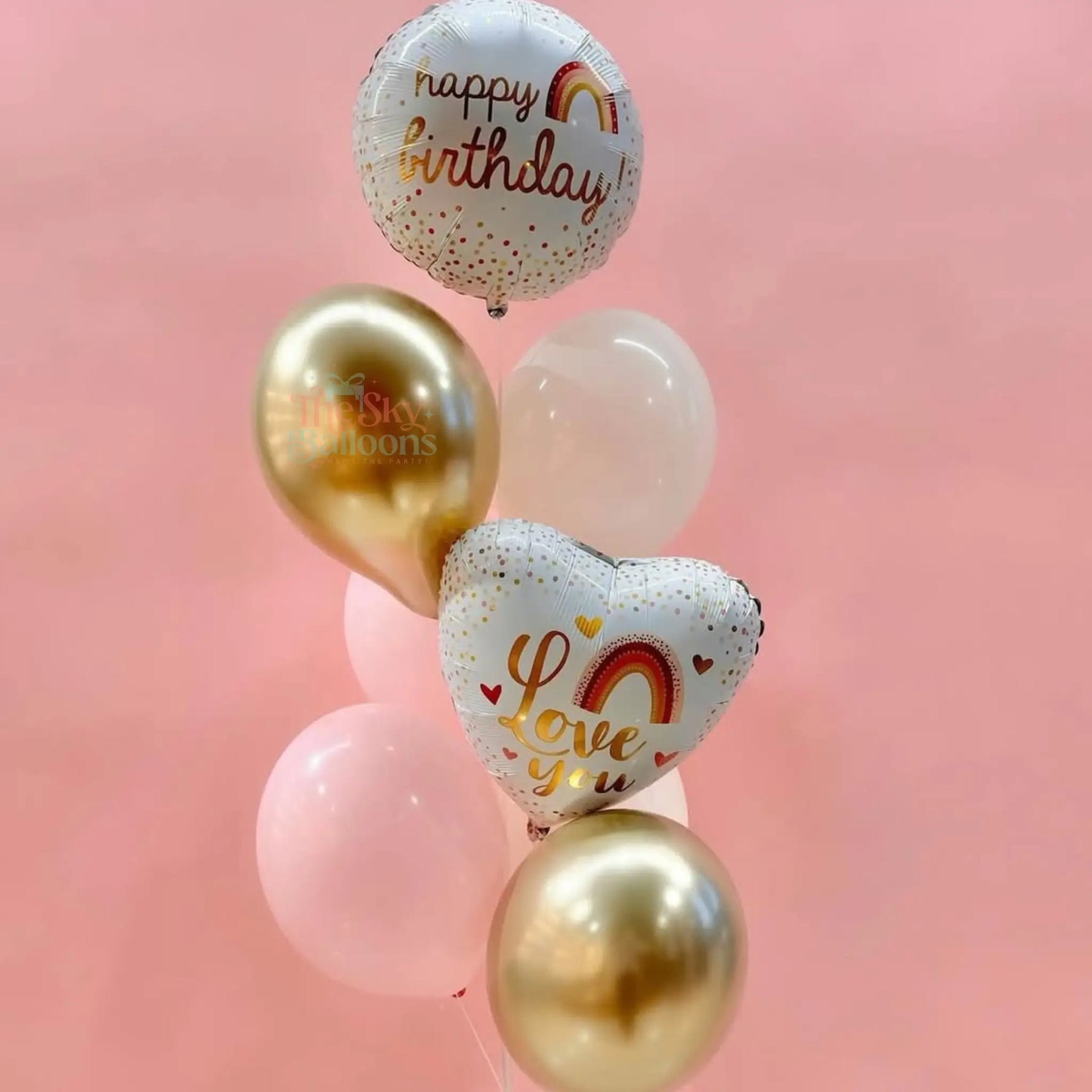 Set of balloons with 'Happy Birthday' and 'I love you' text on a pink background