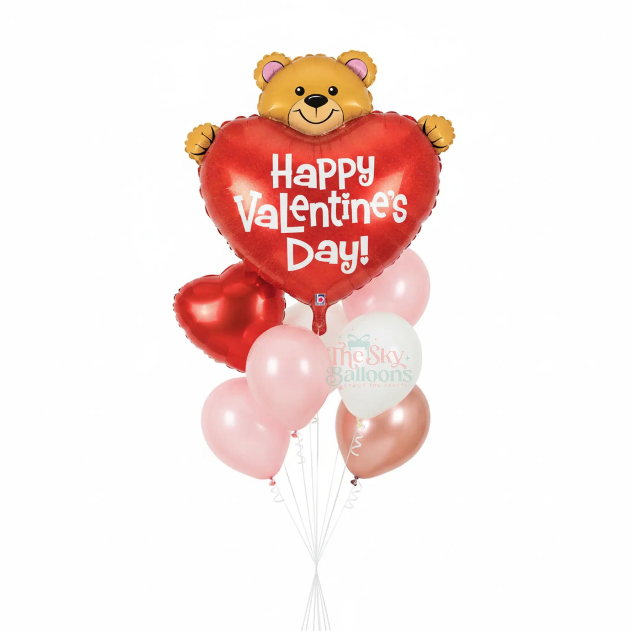 Valentine's Day balloon bouquet with a bear-shaped balloon holding a heart-shaped 'Happy Valentine's Day!' balloon.